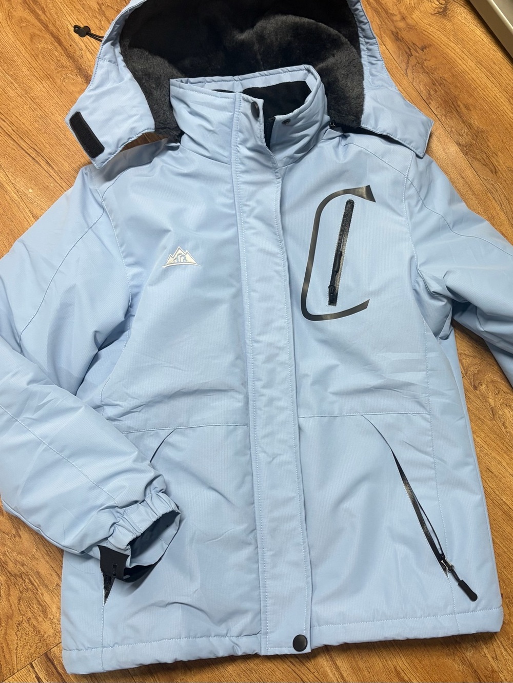 Woman’s small. Light Blue Insulated Hooded Jacket - Brand Unspecified